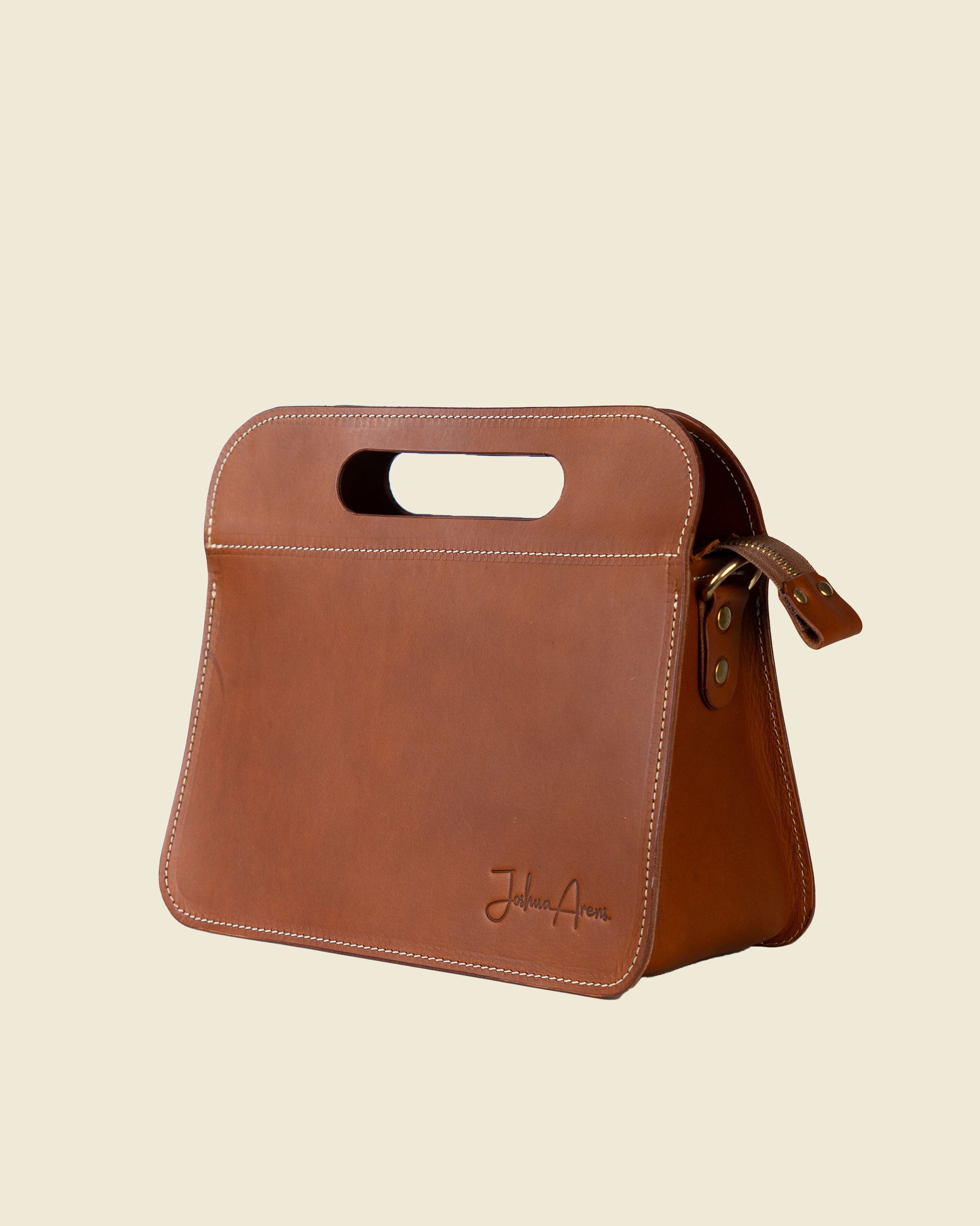 Leather handbag with carrying handle